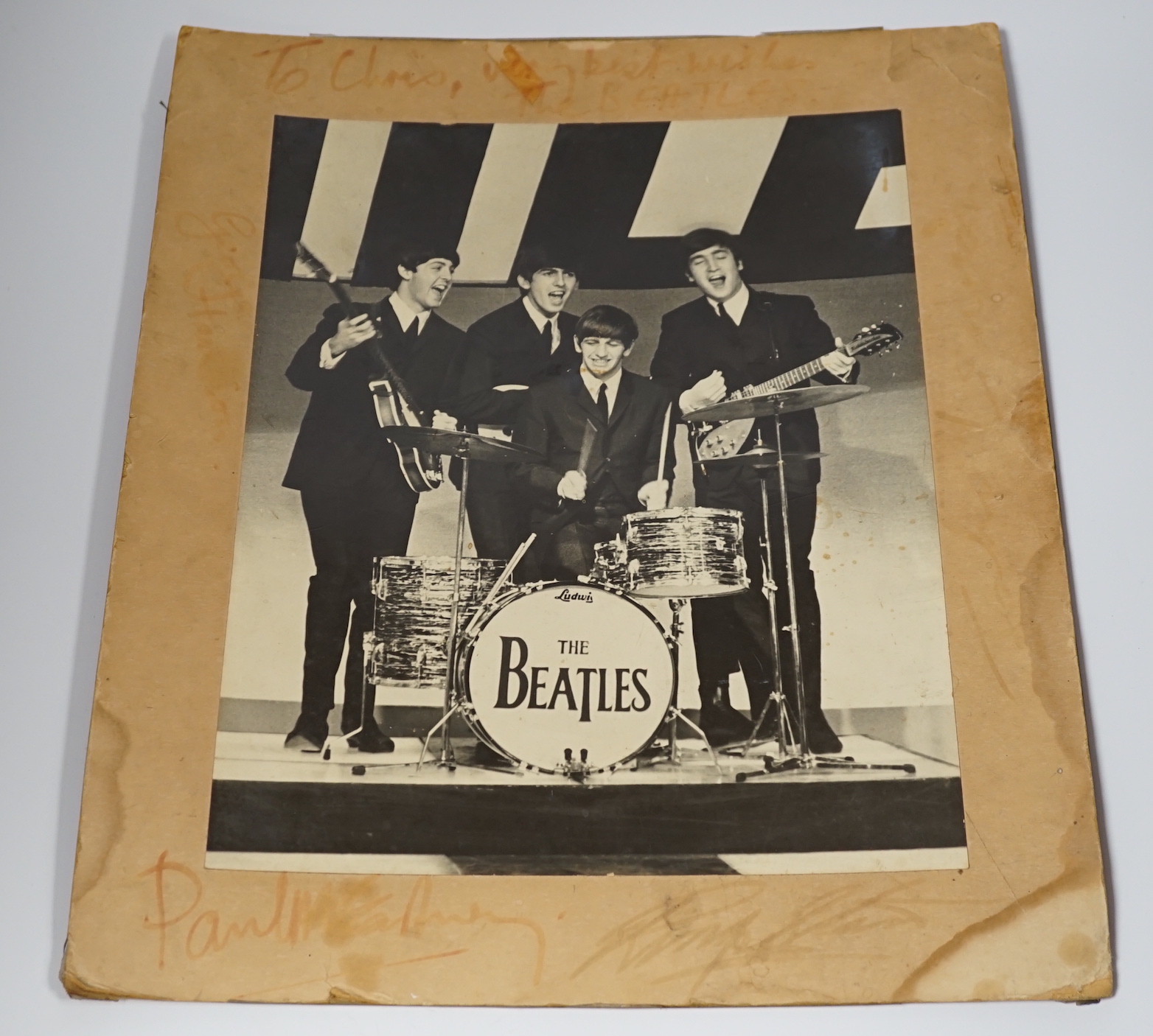 A fully signed mid-1960s The Beatles photo, signed to the original mount to which the photograph is glued